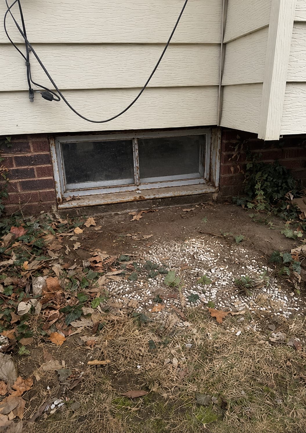 Before: Basement Window Replacement
